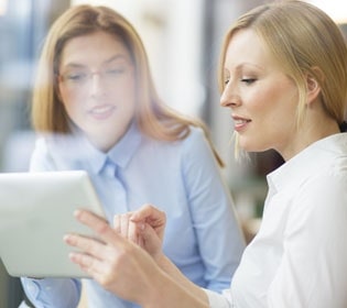 Female co-workers collaborating